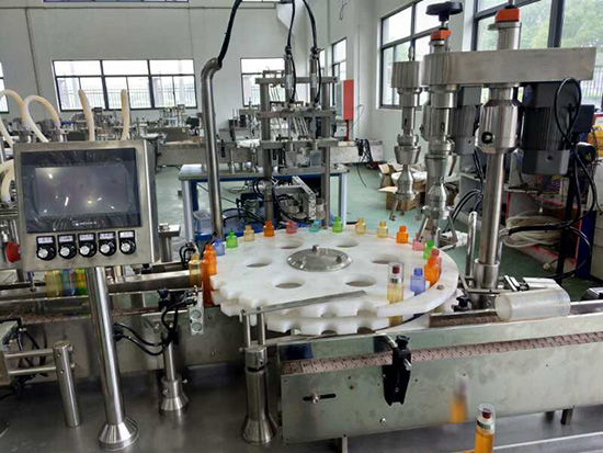 香水灌裝旋蓋一體機(jī)