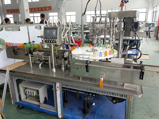 香水灌裝旋蓋一體機(jī)